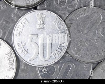 closeup macro shot of shiny vintage 50 paise silver coin of india Stock Photo
