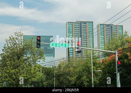 Overhead traffic lights in city. Road rules Stock Photo