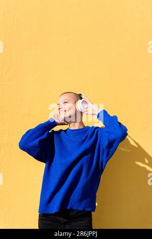 woman enjoying happy the music in her headphones Stock Photo