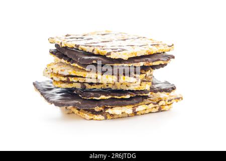 Puffed corn crackers chocolate covered isolated on the white background. Stock Photo
