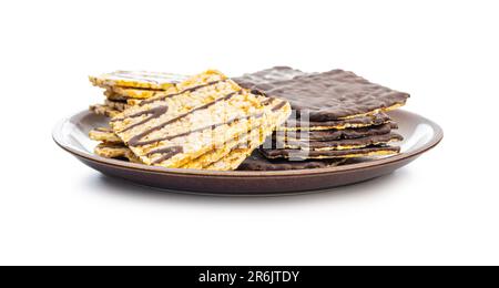 Puffed corn crackers chocolate covered isolated on the white background. Stock Photo