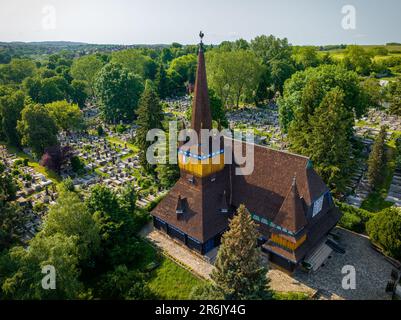 The wooden church of Miskolc city is a unique worship place. The temple built only of wood. Amazing colorful building with wood carving arts. Stock Photo