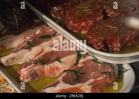 The food prepared in the showcase. Ready to take away. Meat concept. Healthy food. Stock Photo