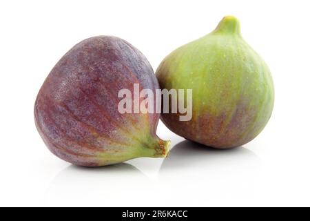 Ripe purple and green fig fruit isolated on white background Stock Photo