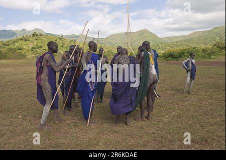 Donga stick fighting ceremony, Surma tribe, Tulgit, Omo Valley, Ethiopia/ Surma Stock Photo