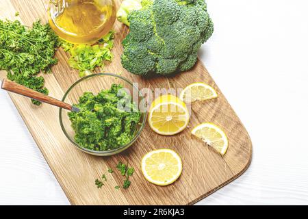 A variety of fresh ingredients arranged on a wooden cutting board Stock Photo
