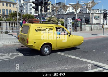 Reliant Robin Van in Yellow RAT 6M Totally Independent Traders at the London to Brighton Modern Classic Car Run which set out from Brooklands Museum. Stock Photo