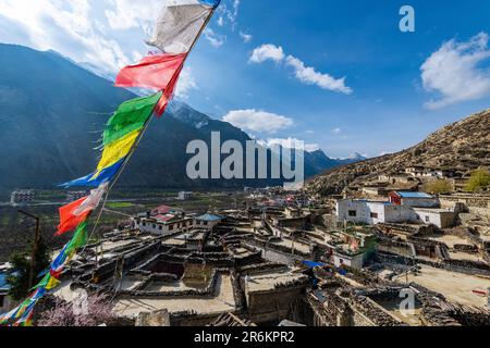 Historical village of Marpha and prayer flags, Jomsom, Himalayas, Nepal, Asia Stock Photo