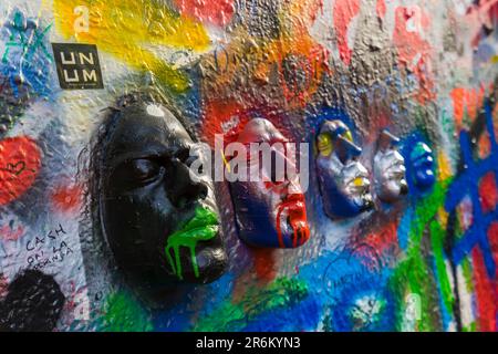 Close-up of artwork faces at John Lennon Wall, Prague, Bohemia, Czech Republic (Czechia), Europe Stock Photo