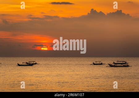 View of sunset and fishing outriggers on Indian Ocean from Kuta Beach,  Kuta, Bali, Indonesia, South East Asia, Asia Stock Photo - Alamy