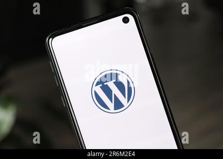 A closeup of Wordpress logo on smartphone screen Stock Photo