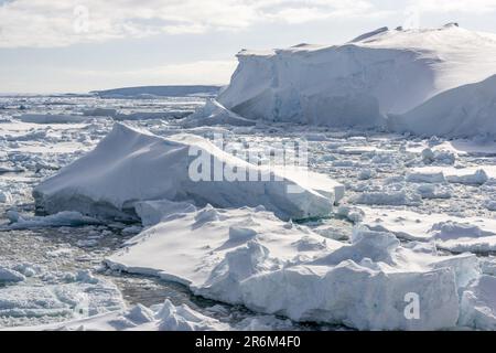 Ice Floes and Tabular Icebergs in Bright Sunshine, Amundsen Sea, Antarctica Stock Photo