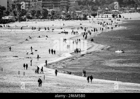 View of people strolling on the beach, Pescara, Italy Stock Photo