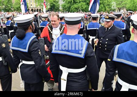 Bristol, UK. 10th July, 2023. On a very warm afternoon crowds turned out to see the HMS Prince of Wales ship awarded the Freedom of Bristol, Beating of drums of the military units colours flying and bayonets fixed outside on the lower walkway in front of City Hall Bristol. Picture Credit: Robert Timoney/Alamy Live News Stock Photo