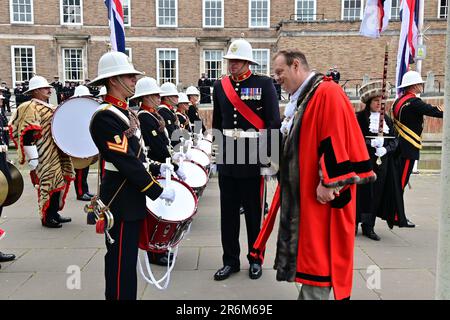 Bristol, UK. 10th July, 2023. On a very warm afternoon crowds turned out to see the HMS Prince of Wales ship awarded the Freedom of Bristol, Beating of drums of the military units colours flying and bayonets fixed outside on the lower walkway in front of City Hall Bristol. Picture Credit: Robert Timoney/Alamy Live News Stock Photo