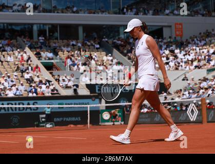 Paris, France. 10th June, 2023. Iga Swiatek of Poland competes during the women's singles final against Karolina Muchova of the Czech Republic at the French Open tennis tournament at Roland Garros in Paris, France, June 10, 2023. Credit: Gao Jing/Xinhua/Alamy Live News Stock Photo