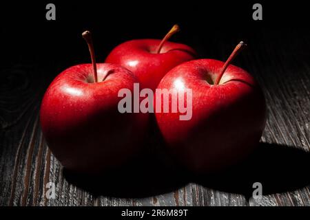 red apples on wood background Stock Photo