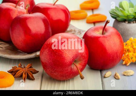 red apples on wood background Stock Photo