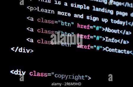 HTML website source code on the screen. Stock Photo