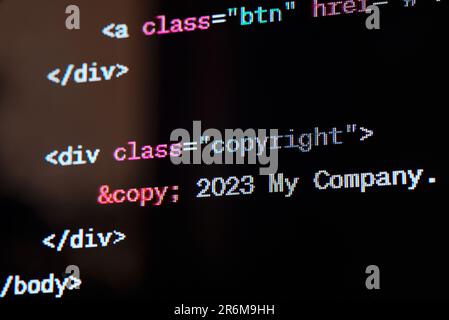 HTML website source code on the screen. Stock Photo