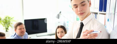 Young male business coach speaker giving presentation Stock Photo