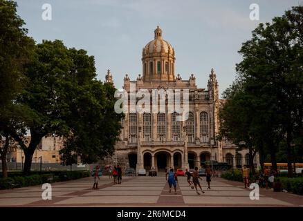 Havana, Cuba. Boys play soccer in front of El Capitolio, Cuba’s capital building. Editorial use only. Stock Photo