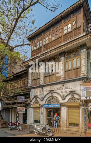 01 10  2007 Vintage Poona Old House With Brick Wall And Wooden Balcony  Window Frameworks Pune Maharashtra India Asia. Stock Photo