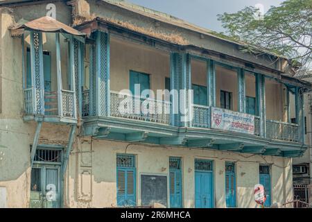 01 10  2007 Vintage Poona Old House With Brick Wall And Wooden Balcony  Window Frameworks Pune Maharashtra India Asia. Stock Photo