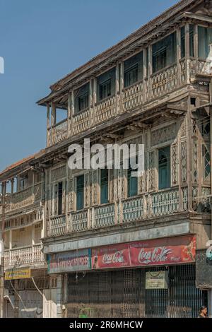 01 10  2007 Vintage Poona Old House With Brick Wall And Wooden Balcony  Window Frameworks Pune Maharashtra India Asia. Stock Photo