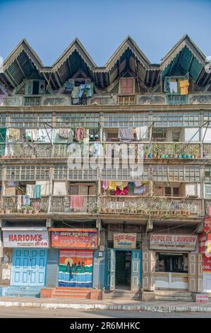 01 10  2007 Vintage Poona Old House With Brick Wall And Wooden Balcony  Window Frameworks Pune Maharashtra India Asia. Stock Photo