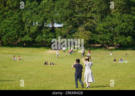 People enjoy the hot weather in Richmond Park, London. Picture date: Saturday June 10, 2023. Stock Photo