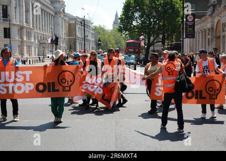 London, UK. 10 June 2023. Just Stop Oil supporters protest as they continue their slow march from Parliament Square to Trafalgar Square demanding an end to all new oil, gas and coal projects in the UK. Credit: Waldemar Sikora/Alamy Live News Stock Photo