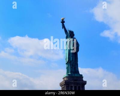 Explore the timeless charm of New York City and the Statue of Liberty through captivating photographs, revealing the city's vibrant energy and iconic Stock Photo