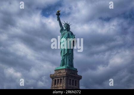 Explore the timeless charm of New York City and the Statue of Liberty through captivating photographs, revealing the city's vibrant energy and iconic Stock Photo