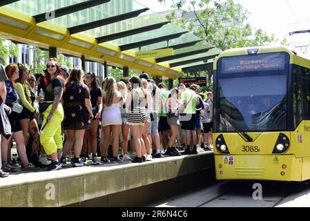 Manchester, UK. 10th June, 2023. Metrolink tram platforms are crowded as some 82,000 music fans head to Parklife festival, the annual music festival held in June each year in Heaton Park, Manchester, UK, for the first day of the two day event. Metrolink closed some central Manchester tram stops, like Exchange Square, Market Street, and Piccadilly Gardens stops, as such large numbers are travelling. This surprised some travellers who were unaware that tram stops would be closed. Credit: Terry Waller/Alamy Live News Stock Photo