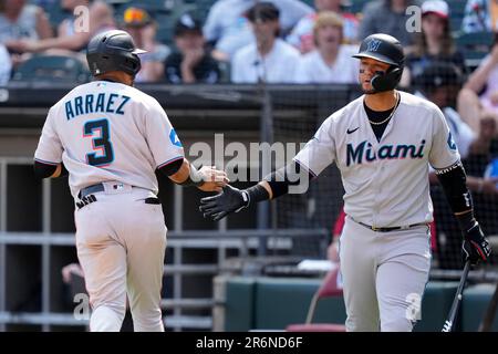 Miami Marlins' Yuli Gurriel celebrates the last out of the third