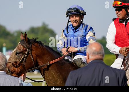 Cody's Wish, with jockey Junior Alvarado, crosses the finish line to ...