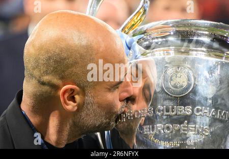 Istanbul, Turkey. 10th June, 2023. 10 Jun 2023 - Manchester City v Inter Milan - UEFA Champions League - Final - Ataturk Olympic Stadium.                                                                                           Pep Guardiola kisses the Champions League trophy.                   Picture Credit: Mark Pain / Alamy Live News Stock Photo