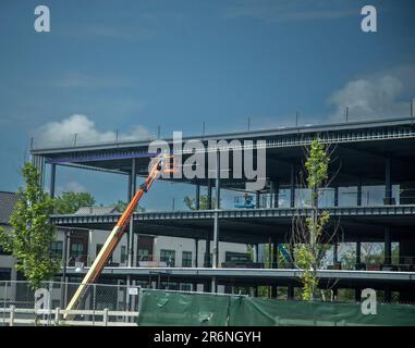 Workers working on the construction of a new office building Stock Photo