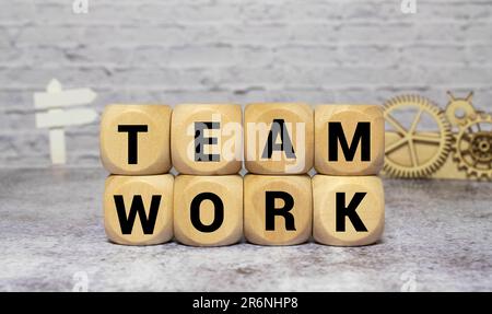 TEAMWORK word written on wood block. Stock Photo