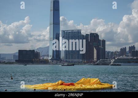 Hong Kong. 10th June 2023. A deflated enormous inflatable duck seen at Victoria Harbour. Starting from June 10th, 2023, the highly anticipated art exhibition named 'Double Ducks,' created by Dutch artist Florentijn Hofman, officially opens to the public at Victoria Harbour in Hong Kong. Credit: SOPA Images Limited/Alamy Live News Stock Photo