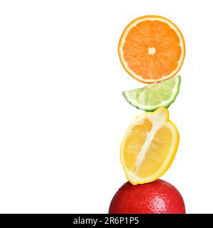 Stack of different fresh citrus fruits on white background Stock Photo