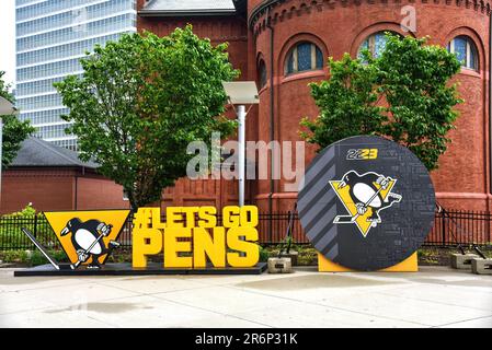 Pittsburgh, PA, USA- May 20, 2023: Promotional display for the NHL team Pittsburgh Penguins outside the Paints Arena in Pittsburgh. Stock Photo