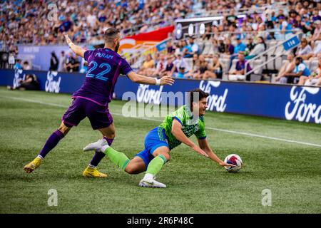 Charlotte, NC, USA. 10th June, 2023. Charlotte FC forward Justin Meram (22) trips up Seattle Sounders midfielder Obed Vargas (73) during the first half of the Major League Soccer match up at Bank of America Stadium in Charlotte, NC. (Scott KinserCal Sport Media). Credit: csm/Alamy Live News Stock Photo