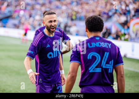 Charlotte, NC, USA. 10th June, 2023. Charlotte FC forward Justin Meram (22) celebrates with defender Jaylin Lindsey (24) after his first half goal against the Seattle Sounders in the Major League Soccer match up at Bank of America Stadium in Charlotte, NC. (Scott KinserCal Sport Media). Credit: csm/Alamy Live News Stock Photo