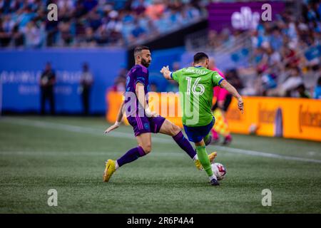 Charlotte, NC, USA. 10th June, 2023. Charlotte FC forward Justin Meram (22) blocks the pass from Seattle Sounders midfielder Alex Roldan (16) during the first half of the Major League Soccer match up at Bank of America Stadium in Charlotte, NC. (Scott KinserCal Sport Media). Credit: csm/Alamy Live News Stock Photo