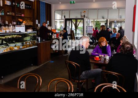 MELBOURNE, AUSTRALIA - June 01: Middle Park locals are seen enjoying coffee and a meal in at The Avenue Food Store in Middle Park for the first time in three months on 01 June, 2020 in Melbourne, Australia. Victoria is open for business as cafes, bars and restaurants once again open their doors for a maximum of 20 sit down patrons from today. The Victorian Premier Daniel Andrews, announced on the 16th May that all cafes, restaurants and bars will  be able to reopen for up to 20 patrons per enclosed space from the 1st of June and then a further easing of restrictions to 50 patrons on the 22nd o Stock Photo