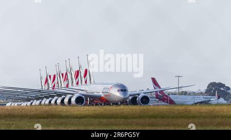 MELBOURNE, AUSTRALIA - APRIL 27: Amid an unprecedented decline in air travel due to COVID 19 Qantas and Jetstar are having to ground their aircraft. Jetstar and Qantas aircraft stowed at Avalon Airport on 27 April, 2020 in Melbourne, Australia. Stock Photo