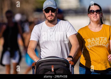 MELBOURNE, AUSTRALIA - MAY 16: Melbournians made the most of their new found freedoms and the perfect autunm weather as many were seen walking along the beach as restrictions are being eased in Victoria during COVID 19 on 16 May, 2020 in Melbourne, Australia. Stock Photo