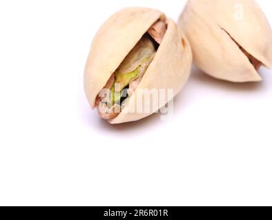 Pistachio nuts, fruits isolated on the white background Stock Photo